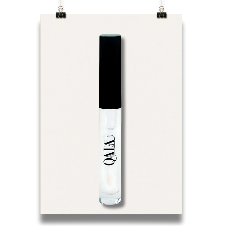 Clear lip gloss with black cap on a white background - Vegan plumping lipgloss with hydration and volume boost