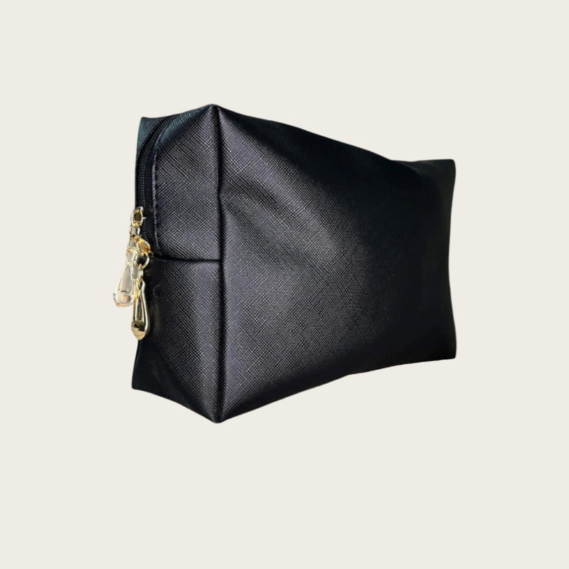 The Everywhere Makeup Bag. Designed for longer days and getaways, this spacious, multi-purpose bag keeps your essentials organized and secure. 
